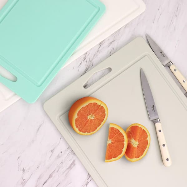 https://images.thdstatic.com/productImages/3d89a4ee-fd7c-45f5-89f0-74d5d76ccc0f/svn/martha-stewart-cutting-boards-985118761m-fa_600.jpg