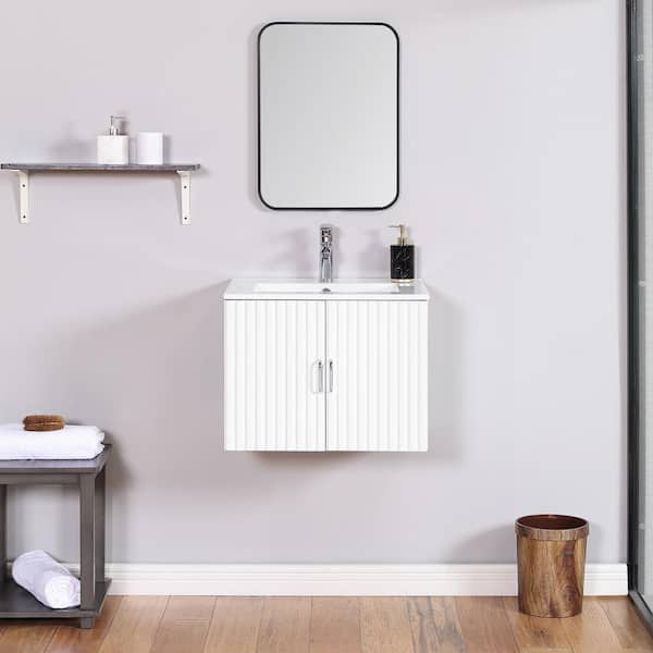 23.62 in. W x 17.72 in. D x 18.7 in. H Single Sink Wall Bath Vanity in White with White Ceramic Top