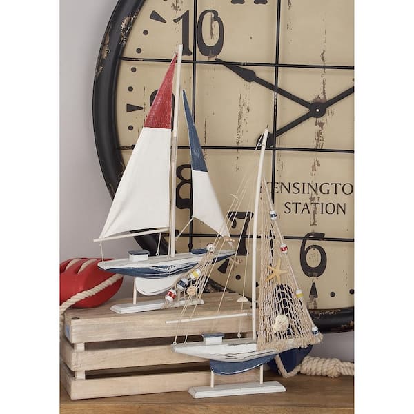 Oriana White 13 in. x 22 in. Sail Boat  Wood Sculpture (Set of 2)