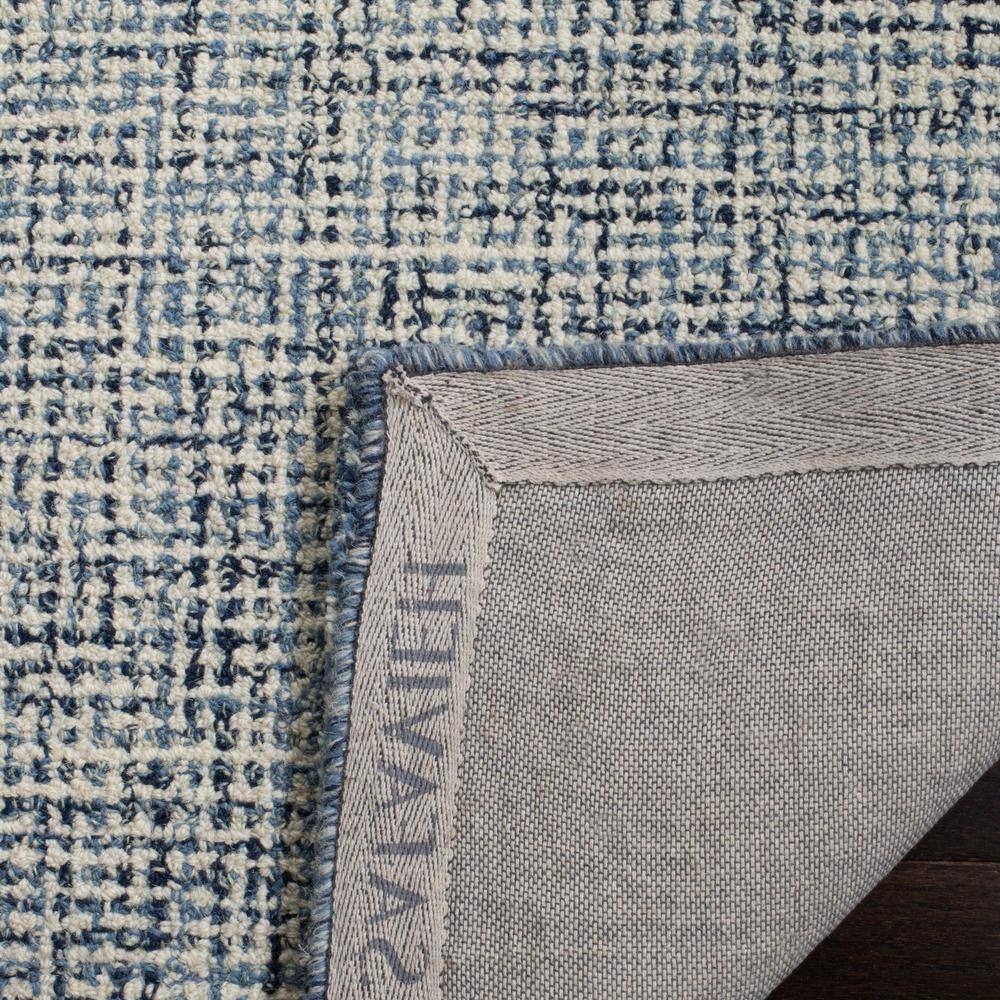 Navy and Ivory Handmade Wool Tufted 5' x 8' Area Rug