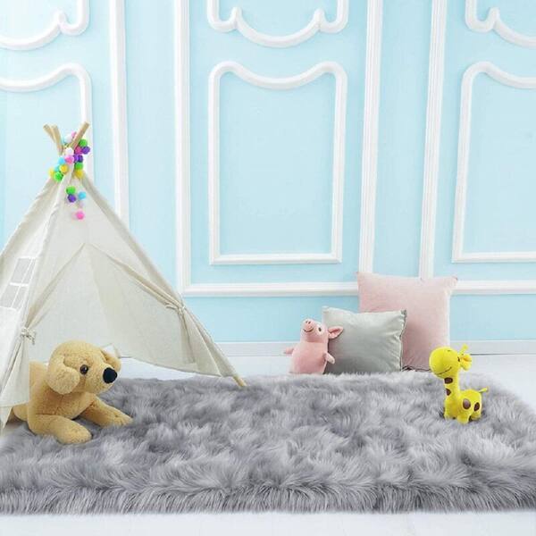GHOUSE Silky Faux Fur Sheepskin Shag Light Gray 8 ft. x 10 ft