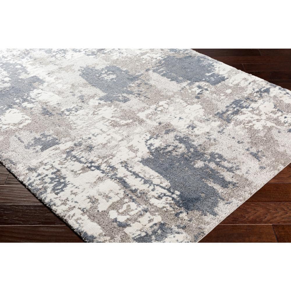 Blue and Beige Abstract 9' x 12' Synthetic Area Rug