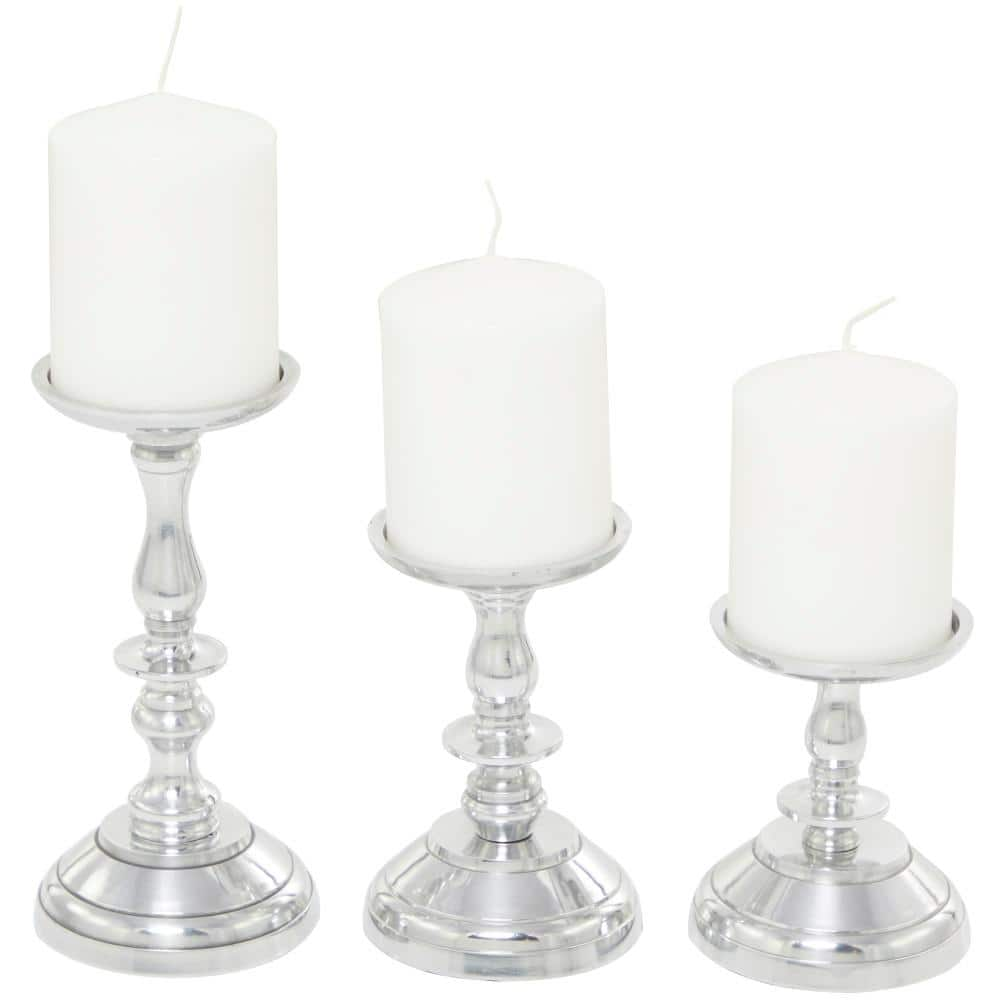 Litton Lane Silver Aluminum Pillar Candle Holder (Set of 3)