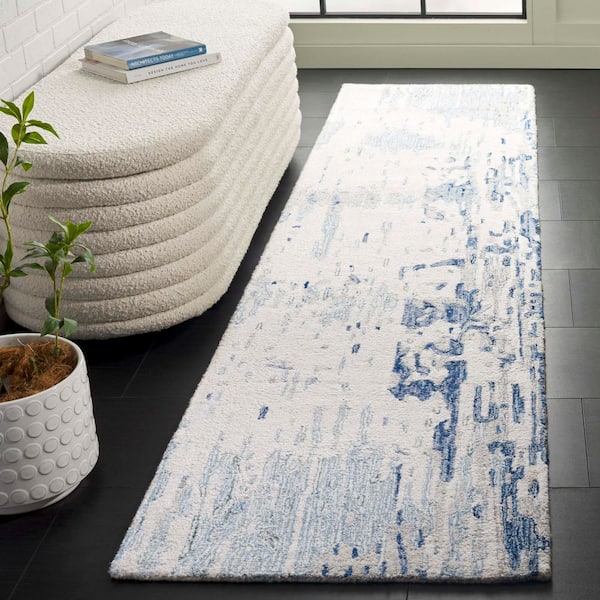 Metro 2 ft. x 9 ft. Ivory/Blue Distressed Abstract Runner Rug