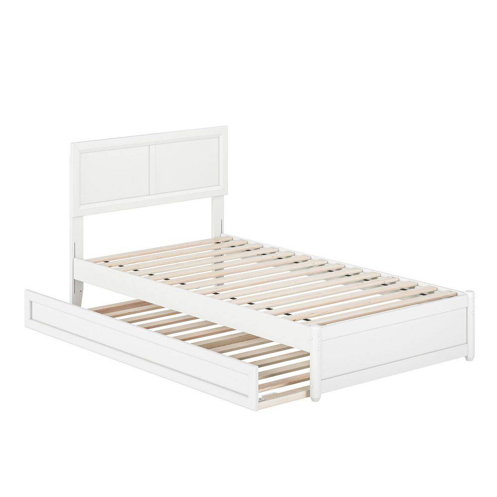 White wood frame twin bed with wooden slat base.