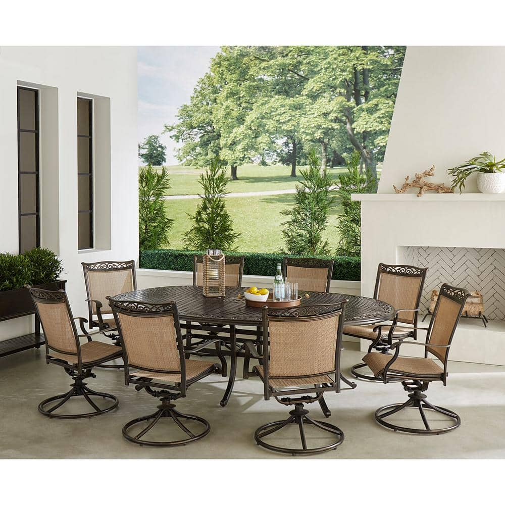 Fontana 9-Piece Bronze Outdoor Dining Set with Swivel Rockers