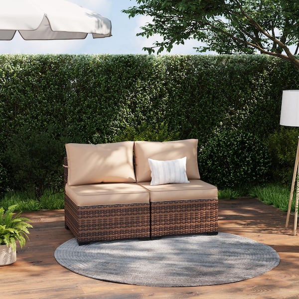 Brown Wicker Outdoor Loveseat with Beige Cushions