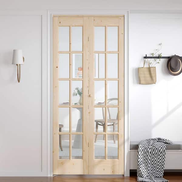 36 in. x 80 in. Pre Assembled Clear Glass Solid Core Wood Spruce Bi-fold Door with Hardware
