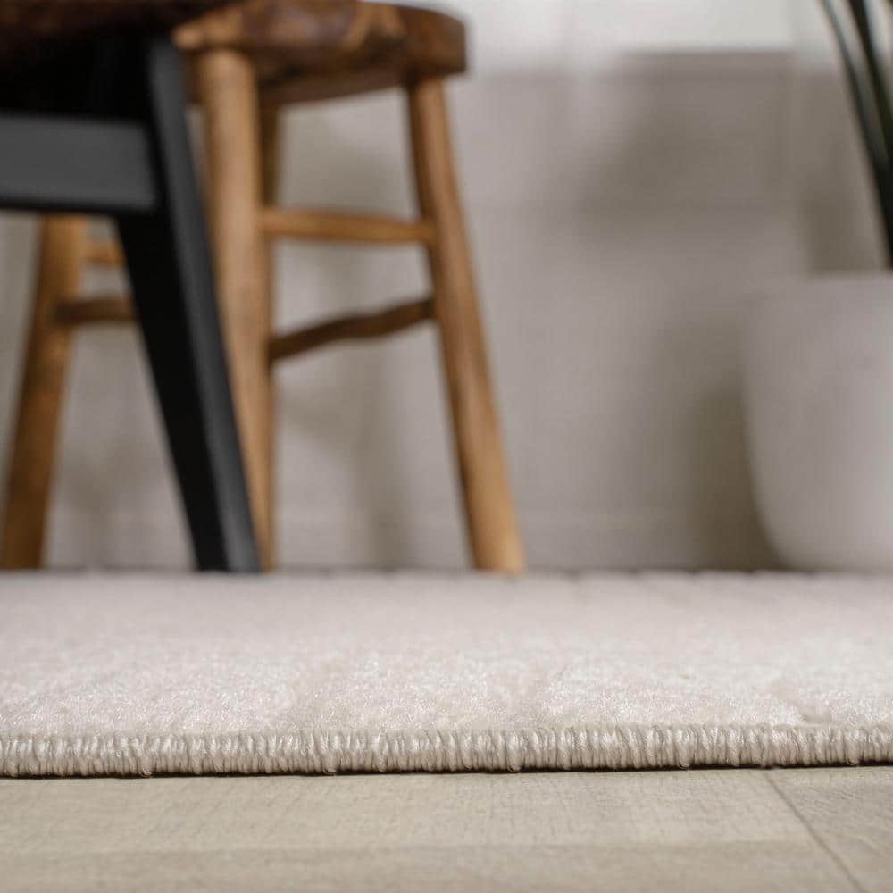 Ivory Geometric 8' x 10' Synthetic Washable Area Rug