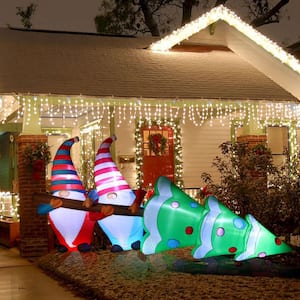 Lighted 4 ft. H x 8 ft. W Gnome Elves with Tree Inflatable Holiday Decoration