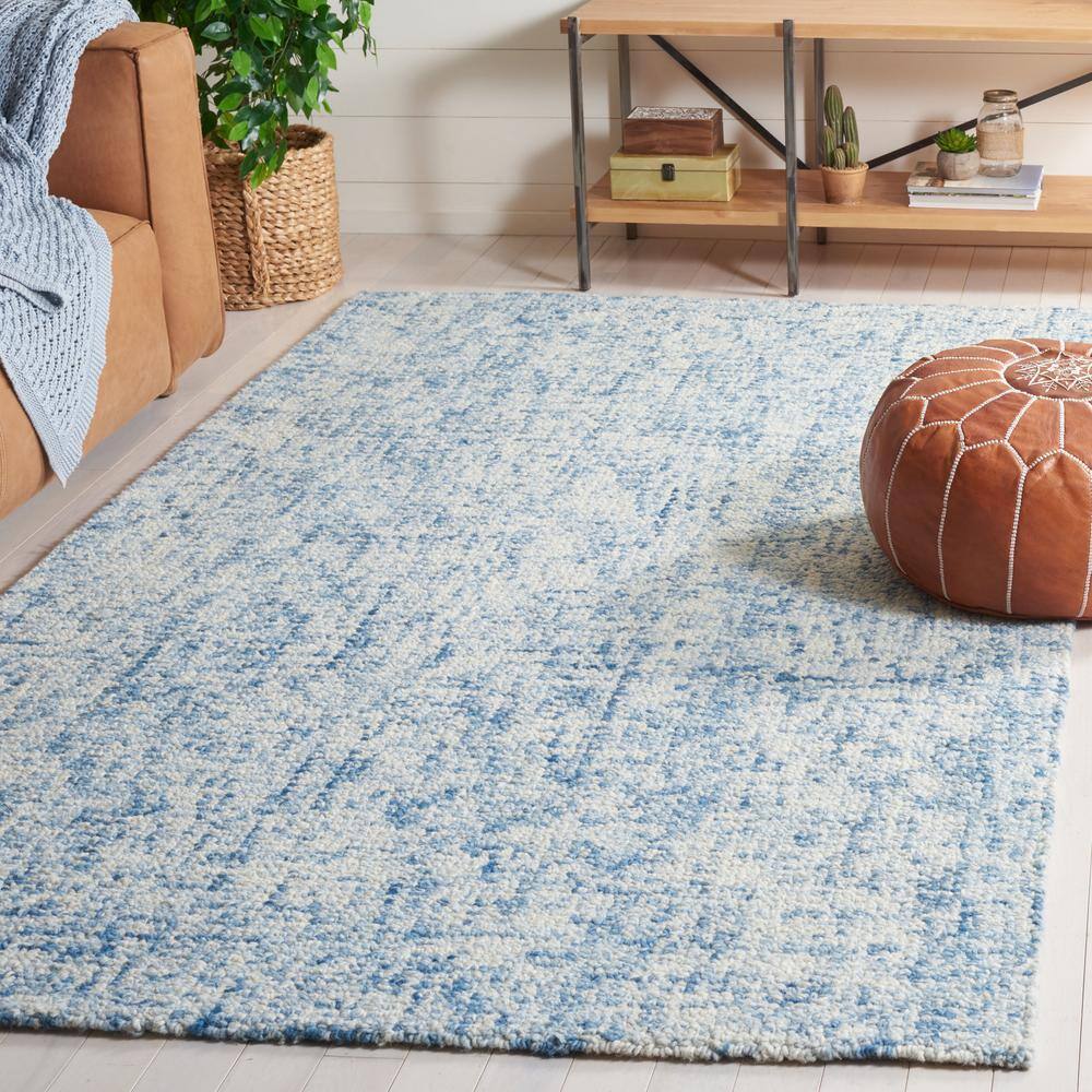 Handmade Blue and Ivory Wool Abstract Tufted Rug, 4' x 6'