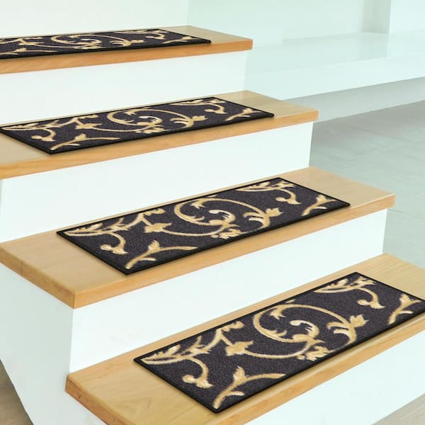 https://images.thdstatic.com/productImages/3e6f440e-808f-4a3a-bf82-131bea32b438/svn/black-ottomanson-stair-tread-covers-oth3043-7-4f_600.jpg