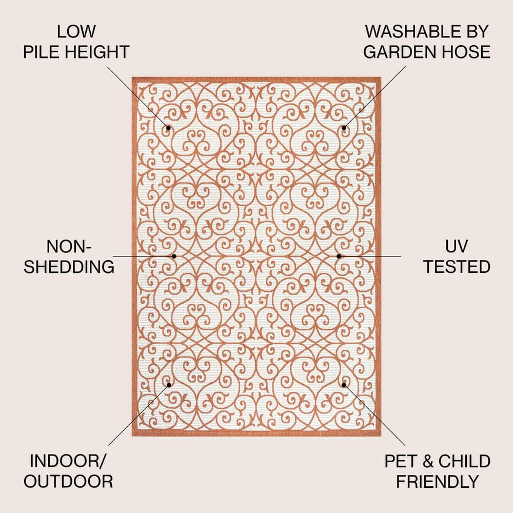 Cream and Orange 8' x 10' Synthetic Flat Woven Reversible Rug