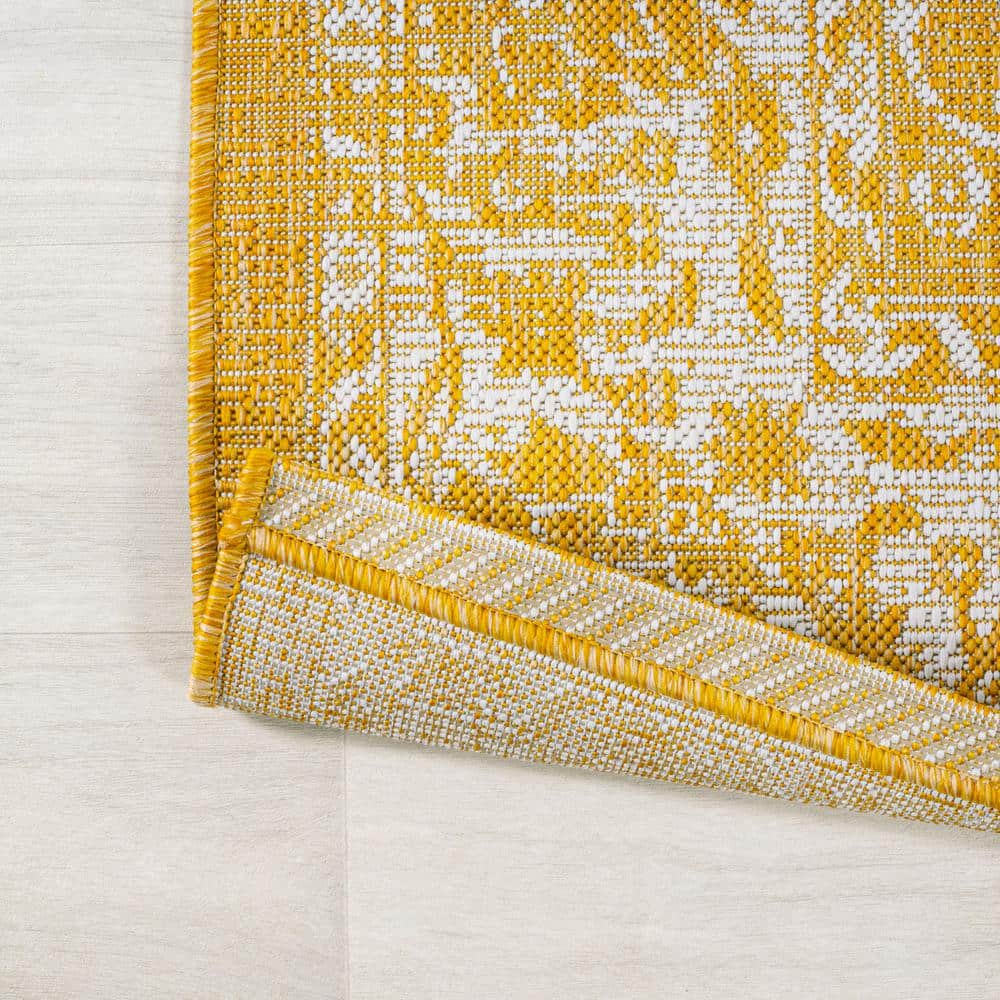 9' x 12' Yellow and Cream Floral Synthetic Rectangular Rug