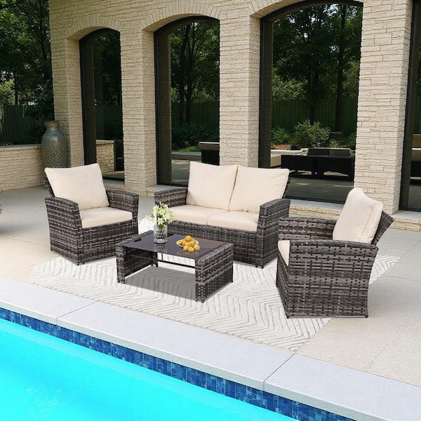 Cesicia 4-Piece Gray Wicker Outdoor Furniture Sectional Set with Glass Table and Beige Cushions