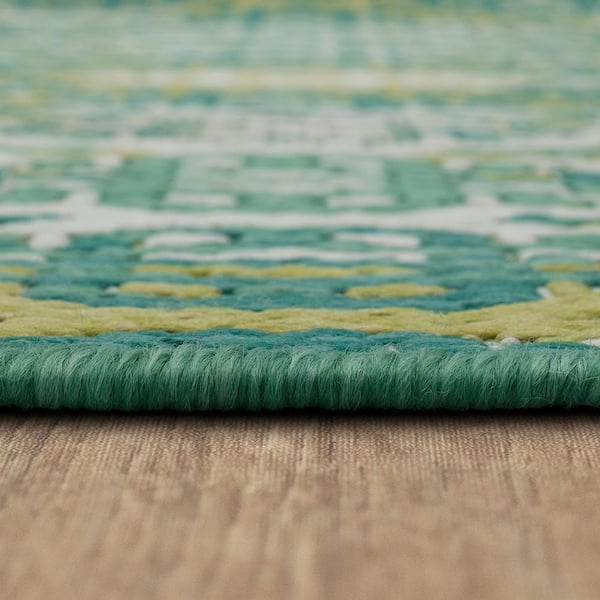 https://images.thdstatic.com/productImages/3e8d3cdb-4265-43dc-a995-28215d3fe029/svn/teal-mohawk-home-outdoor-rugs-791513-c3_600.jpg