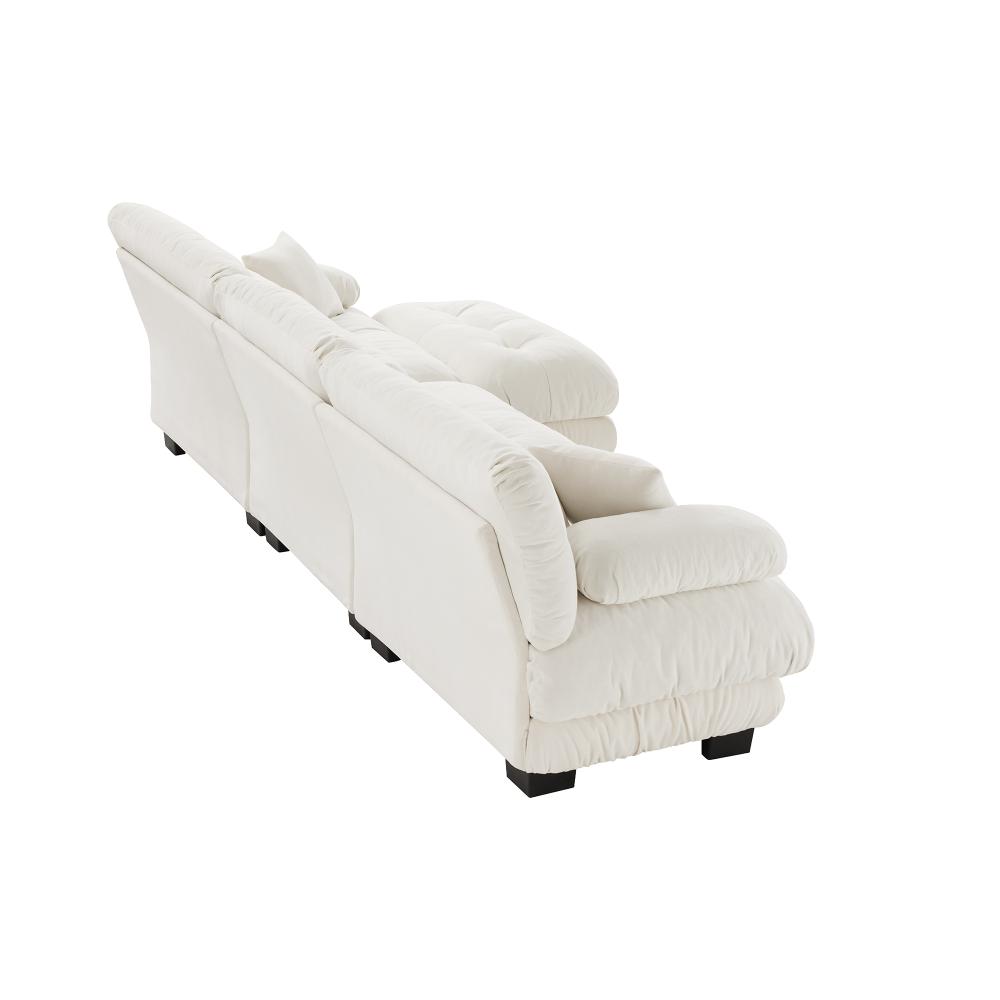 Rear side view of a white chenille modular sectional sofa.