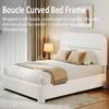 Bouclé curved bed frame design.
