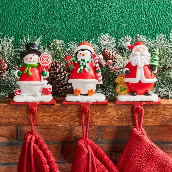 6.25 in. H Set of 3 Resin Santa, Snowman, Penguin Stocking Holder