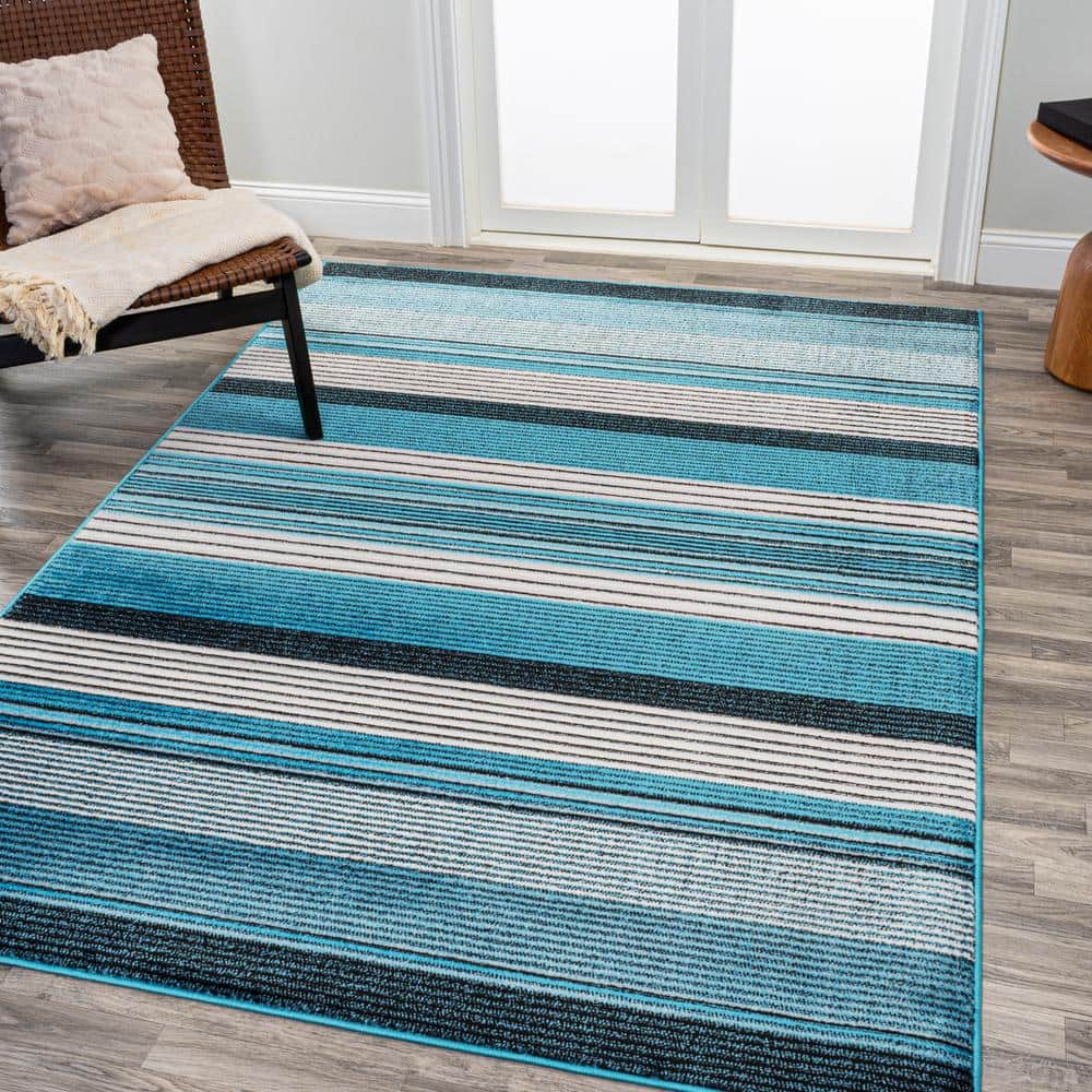 5' x 8' Blue and Navy Gradient Striped Synthetic Area Rug