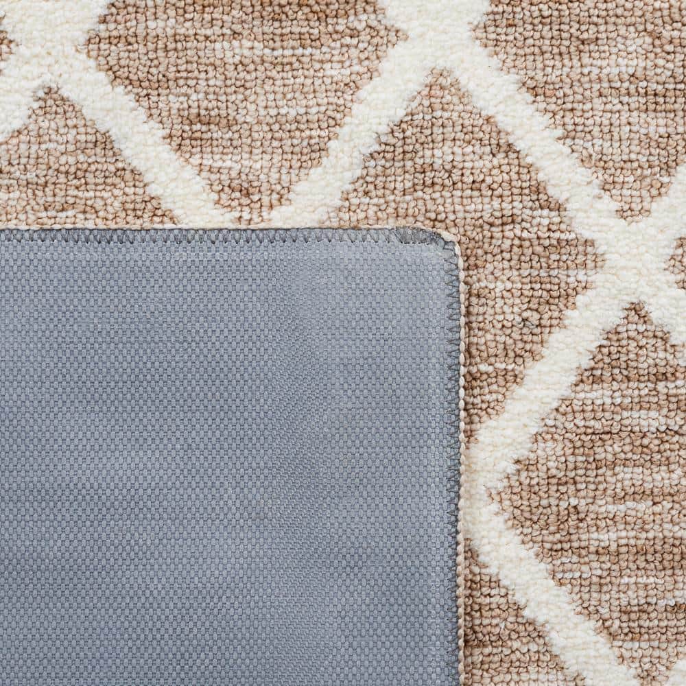 Ivory and Beige Rectangular Washable Synthetic Area Rug