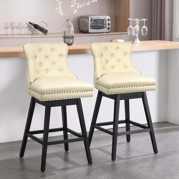 Hochwertiges 26 in. Beige Faux Leather Upholstered Solid Wood Frame Counter Height Swivel Counter Stool (Set of 2)
