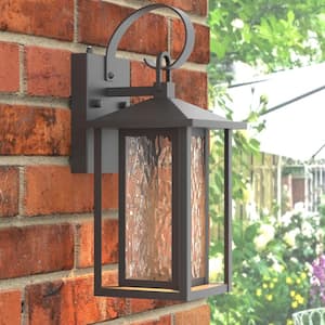 Montpelier 14.35 in. Sand Grain Black Dusk to Dawn Integrated LED Outdoor Hardwired Lantern Sconce with Water Glass