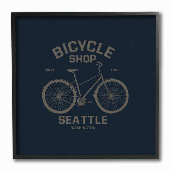 Stupell Industries 12 in. x 12 in. "Navy Blue and Gold Seattle Bicycle Shop Sign" by Artist Bikini Sous La Pluie Framed Wall Art