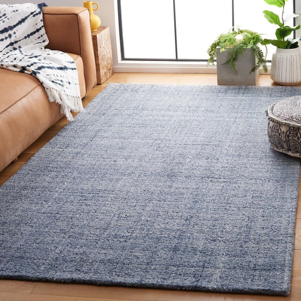 Abstract Ivory/Navy 4 ft. x 6 ft. Classic Marle Area Rug