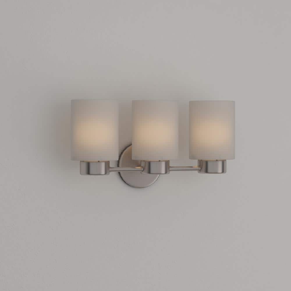 Elegant Brushed Nickel 3-Light Wall Sconce with Frosted Seeded Glass