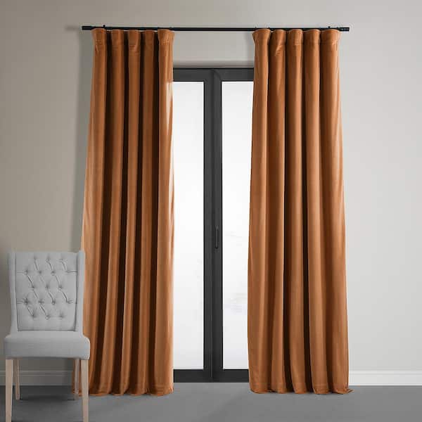 Exclusive Fabrics & Furnishings Burnt Pumpkin Velvet Solid 50 in. W x 96 in. L Lined Rod Pocket Blackout Curtain