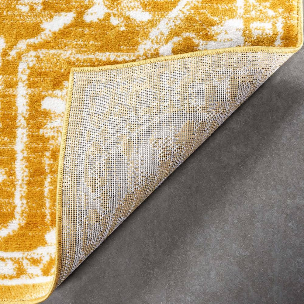 Gold 5' x 7' Synthetic Oriental Easy Care Rug