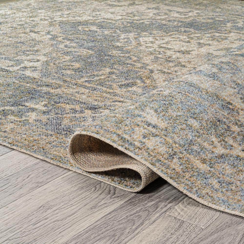 Pavel Distressed Blue and Cream Synthetic Medallion Washable Area Rug 5'3" x 7'7"