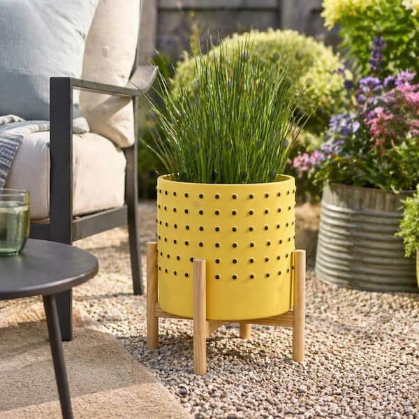 10 in. x 11 in. Yellow Ceramic Dotted Decorative Pot with Wood Stand