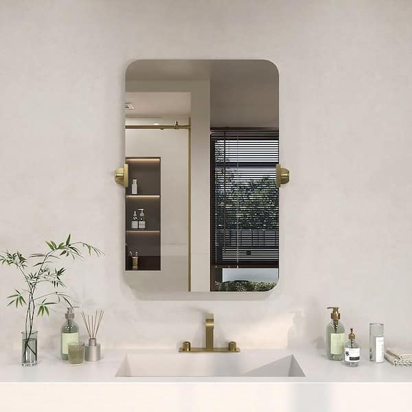 Solvix 20 in. W x 30 in. H Rectangular Framed Tilt Wall Mount Bathroom Vanity Mirror in Brushed Gold