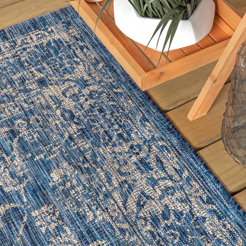 Navy and Gray Floral Synthetic 4' x 6' Reversible Area Rug