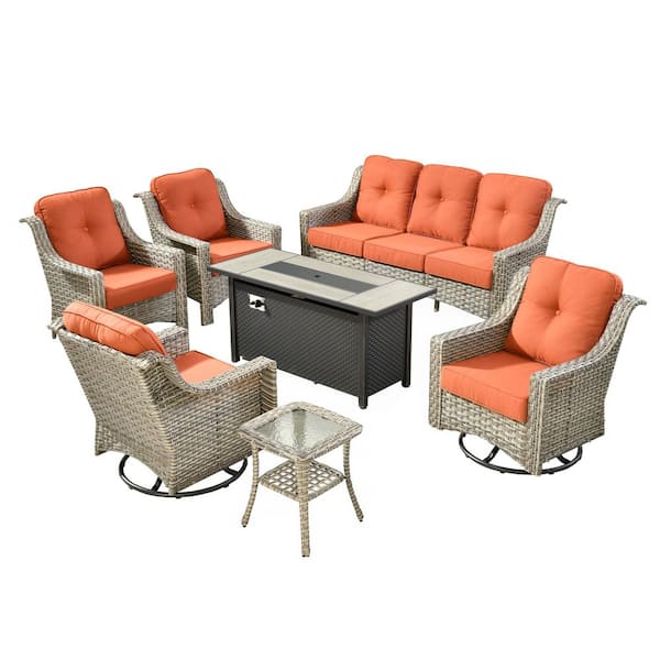 Eureka 7-Piece Wicker Patio Conversation Sofa Swivel Chair Set with Metal Fire Pit Table and Red Cushions
