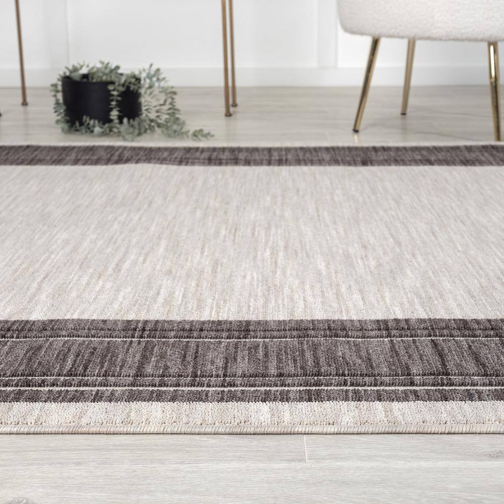 Winona 5' x 7' Ivory Rectangular Synthetic Area Rug