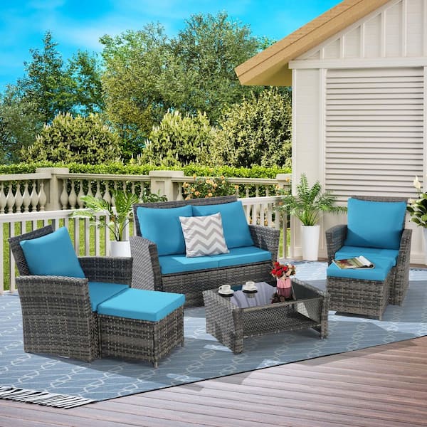 Tenleaf 6-Piece Wicker Patio Conversation Set with Light Blue Cushions, Ottoman and Tempered Glass Coffee Table