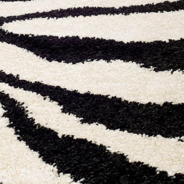 SAFAVIEH Florida Shag Ivory/Black 5 ft. x 8 ft. Animal Print Area