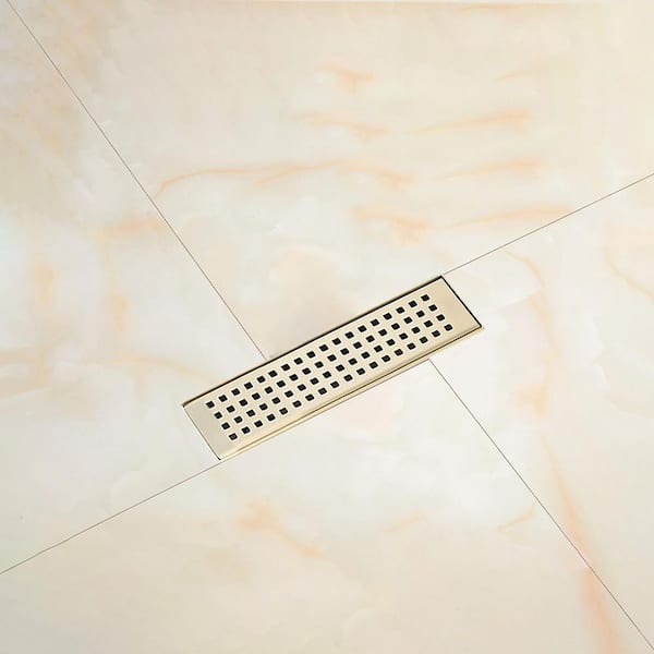12 in. Linear Grid Shower Drain with Leveling Feet in Brushed Gold