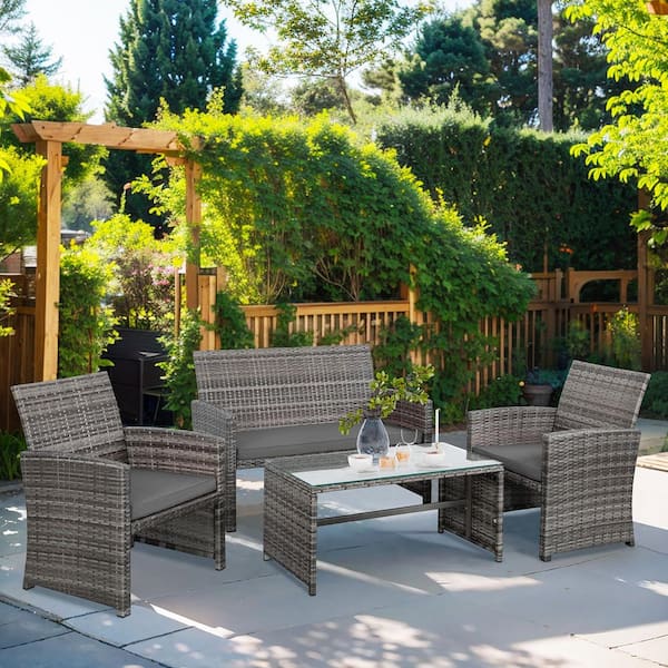 Zeus & Ruta 4-Piece Gray Wicker Patio Outdoor Sectional Sofa Set with Gray Cushions and Ottoman