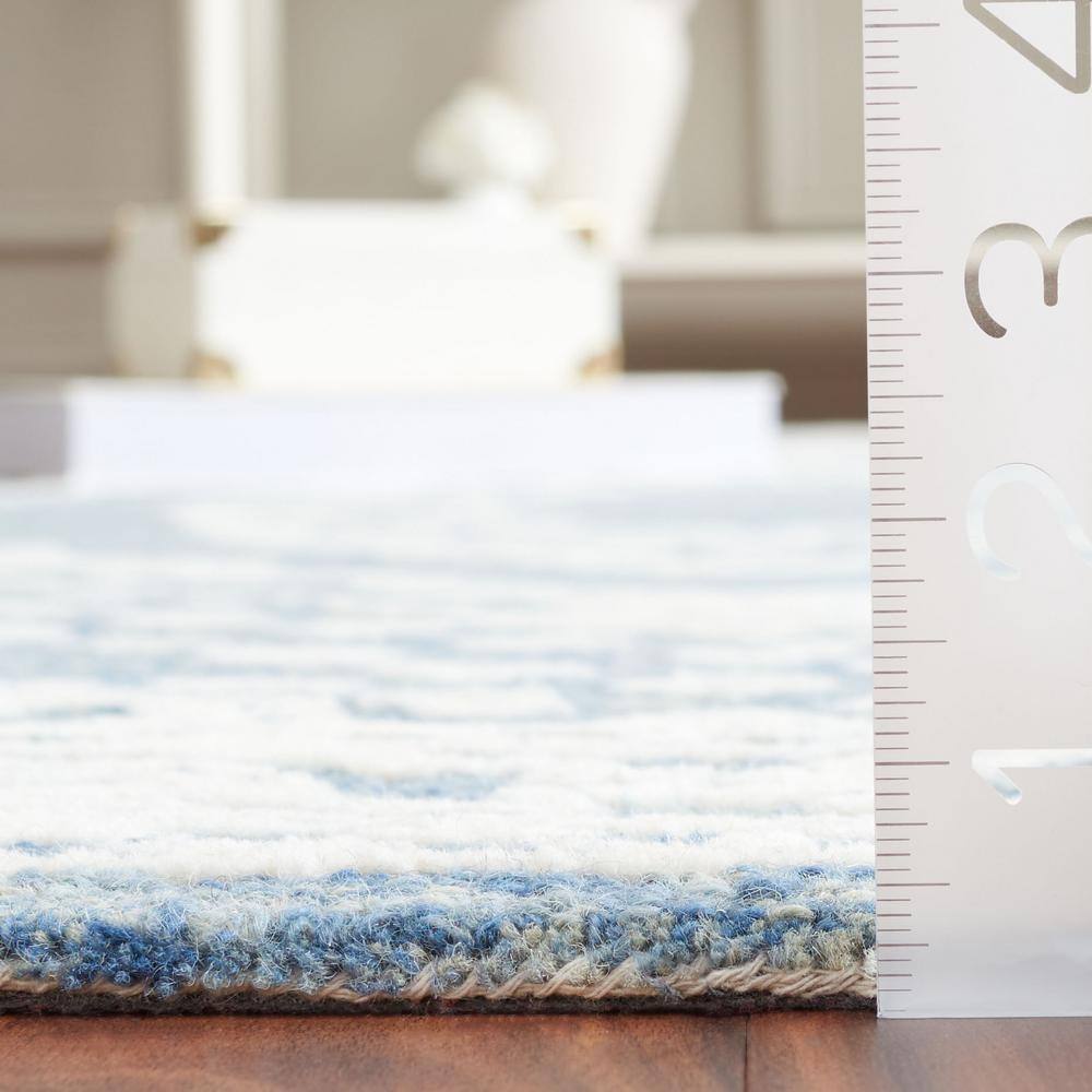 Ivory and Navy Tufted Handmade Wool Area Rug, 6' x 9'