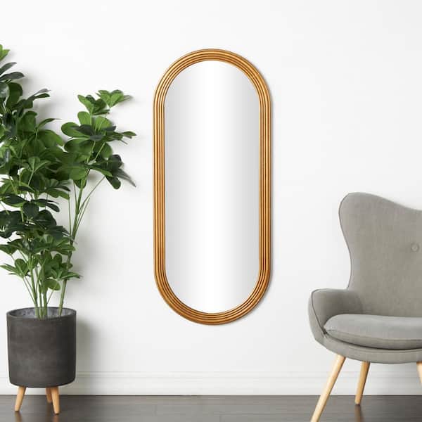 Litton Lane 51 in. x 22 in. Oval Oval Framed Brown Wall Mirror with Dimensional Carved Frame