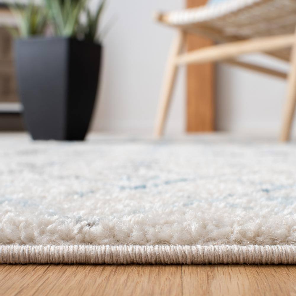 Ivory & Turquoise Boho-Chic 9' x 12' Hand-Knotted Synthetic Area Rug
