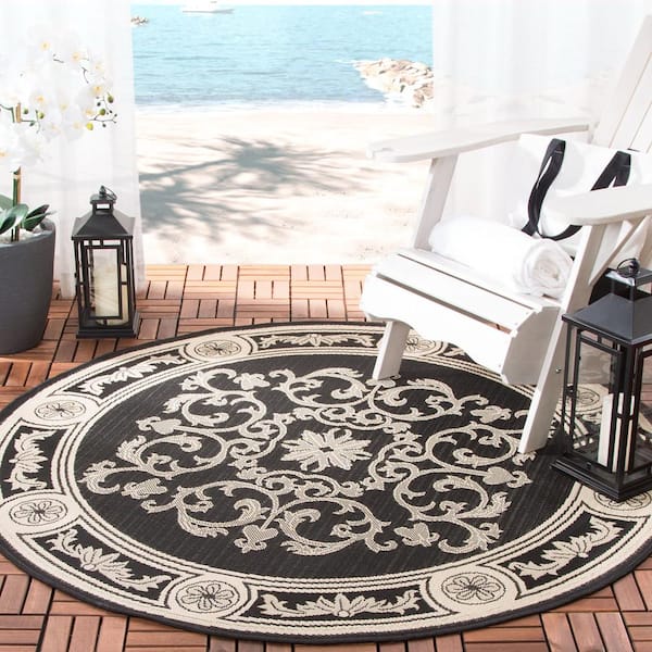 Courtyard Black/Sand 7 ft. x 7 ft. Round Floral Indoor/Outdoor Patio  Area Rug