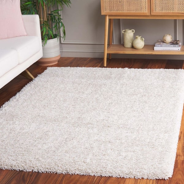 Hudson Shag 5 ft. x 7 ft. Ivory Solid Color Area Rug