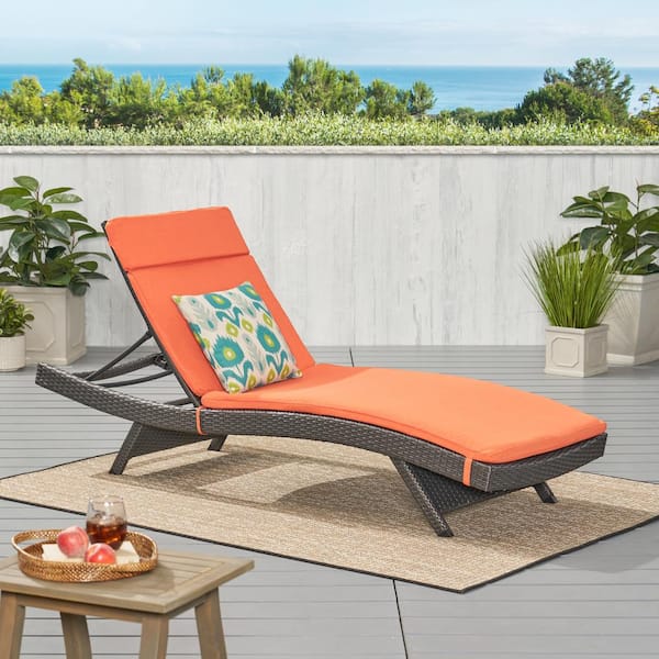Noble House Miller Grey Armless Faux Rattan Outdoor Chaise Lounge with Orange Cushion