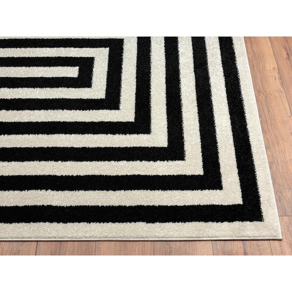 Casa Ivory 5 ft. 3 in. x 7 ft. 6 in. Abstract Polypropylene Area Rug