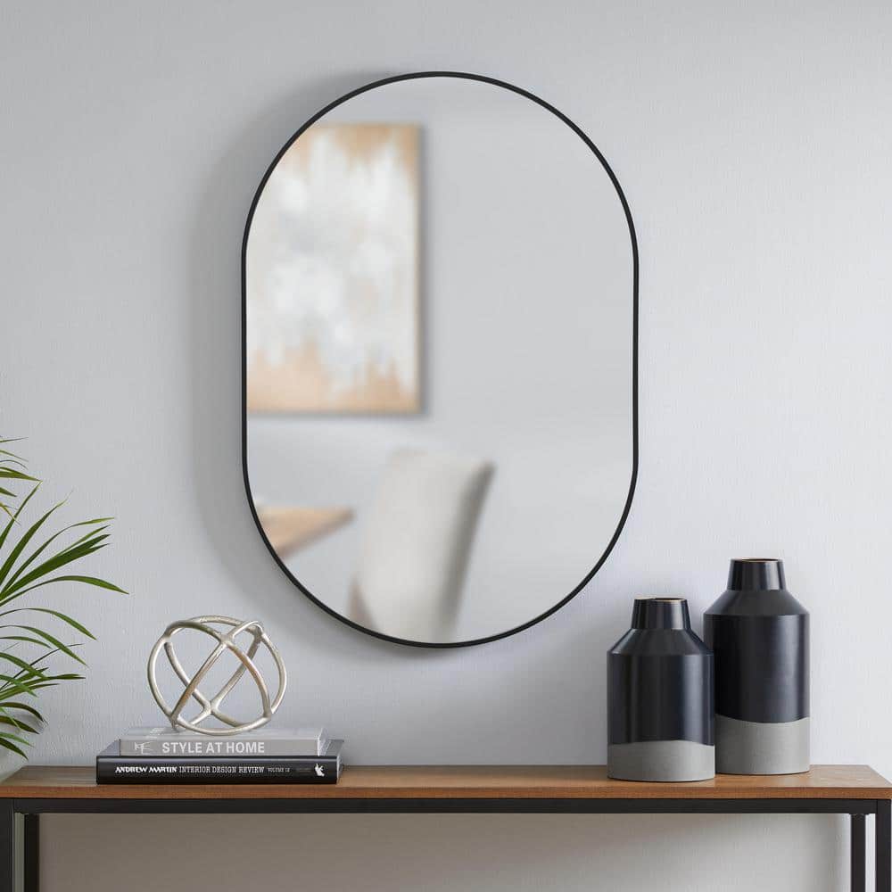 Medium Modern Oval Black Framed Mirror (22 in. W x 32 in. H)